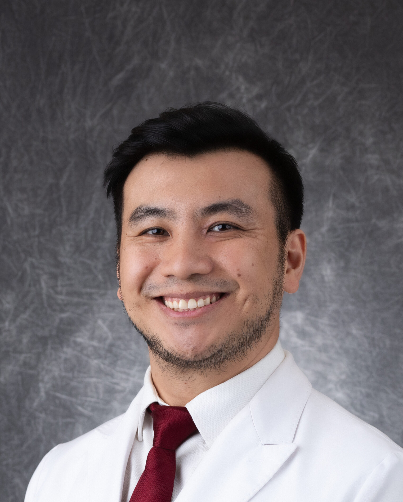 Carlos Woc,O.D.,FAAO